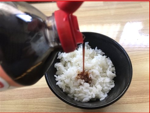 Is it rude to put soy sauce on rice in Japan